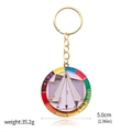 Detailed close-up of a 5cm enamel color wheel keychain with golden alloy finish - Color Wheel Theory Chinese Keychain