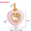 Pink heart pendant with colored enamel finish and central clear zircon in gold frame - M651376 / Light Pink