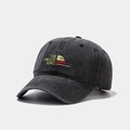Detailed close-up of vintage washed gray cotton baseball cap with The Pirate King embroidery - The Pirate King Black