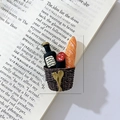 3D food magnet featuring a picnic basket with wine and bread on a vintage book - Wine and Bread Basket