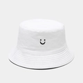 Detail of white cotton bucket hat featuring black smiley embroidery and inner lining - S Kids 52-54cm (2-8 Years) / White/Black Reversible