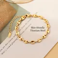 Elegante bracciale a maglie chicco di caffè placcato oro 18K in acciaio al titanio con chiusura - Bracciale / Oro