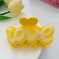 Yellow acetate hair claw clip with heart design and love text on a white plate - 10x5cm / Yellow and Mermaid Pearl