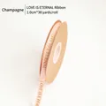 Champagne 1.0cm ribbon with gold Love Is Eternal text for gift wrapping 30 yards - 1.0cm Wide x 30 Yards Long / Champagne