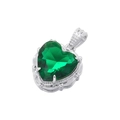 Macro shot of a luxury heart pendant featuring a faceted green gemstone in silver setting - Platinum Green Zirconia