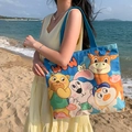 Off-white canvas tote bag featuring cute animal illustrations and blue shoulder straps - Happy Animals