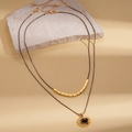 18k gold plated double layer necklace featuring an oval tiger eye stone pendant - Gold