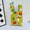 Knitted tote bag in bright yellow with colorful polka dots and red cartoon pattern - Polka Dot Puppy Yellow