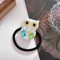 White owl hair tie with multicolored crystals and gold beads on a black elastic band - Dazzle White-4.8cm