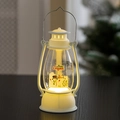 Close-up of a white Christmas lantern with snowman graphics and warm LED light decoration - Snowman