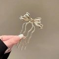 Silver bow-shaped hair pin with four wavy prongs for elegant Chinese hair styling - Bowknot Hair Comb - Gold
