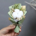 Close-up of mini cotton flower bouquet with green paper wrap and twine bow - Single Cotton (Light Green Wrapping)