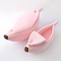 Pink banana-shaped pet bed made of soft plush fabric for cats and small dogs - Pink