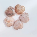 Five heart-shaped strawberry quartz stones with polished finish and natural textures - Sunstone/Strawberry Quartz Look (3)