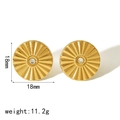 Detail of 18mm gold titanium earrings with radial texture and center gemstone - Gold with White Zircon
