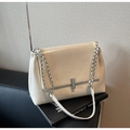 Detail of off-white PU leather bag featuring a silver chain strap and cylindrical metal lock - Off-white
