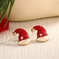 Christmas hat earrings in red enamel and gold finish with small star details - Red Gold Santa Hat (EAR0019)