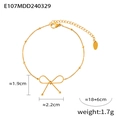 Elegante bracciale dorato con ciondolo a fiocco, catena a perline e chiusura regolabile - Bracciale a Fiocco / Oro