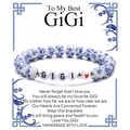 Dettaglio del bracciale in perline di ceramica Gigi con motivi floreali in porcellana blu e bianca - Gigi