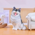 Cute resin husky puppy figurine in grey and white sitting on a decorative wood surface - A182-06 Husky