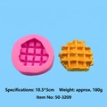 Pink silicone waffle mold for DIY fondant and wax with yellow sample on blue background - Waffle-50-3209-A