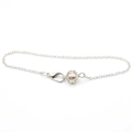 Detail view of silver hollow ball pendant on chain with lobster clasp for yoga jewelry - Silver Hollow Chain