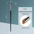 Sickle-shaped eyeliner brush with fine synthetic bristles and slim black handle - Sickle-Shaped Eyeliner Brush