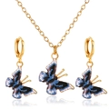 Golden butterfly jewelry set with blue enamel pendants and matching hoop earrings - KC Gold Black & Gray 3934 (2-Piece Set)