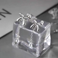 Silver bow dangle earrings with delicate chains and polished beads on ice block base - Tassel Bow Round Bead (A176)