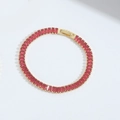 Minimalist tennis bracelet with rectangular red zircon stones in golden finish - Rose Red