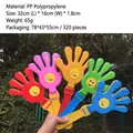 Set of five colorful plastic hand clappers with smiley face stickers for parties - With Smiley / 32cm