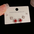 Elegant 925 silver earring set featuring red bead floral design and sparkling stud accents - Silver-Rotating Red Pearl Set (29#)