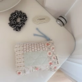 Close-up of floral quilted mini pouch with leopard scrunchie and crochet hair clip - Beige with Geometric Floral
