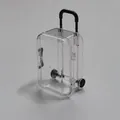 Transparent mini suitcase jewelry box with black handle and movable wheels - Black