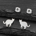 Minimalist cat silhouette stud earrings in polished silver finish on stone background - Cat Silver