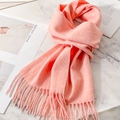 Elegant pink wool scarf with soft fringed ends displayed on a minimalist marble background - Light Pink Mix