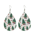 Detail of teardrop faux leather earrings with festive Christmas tree and gift box prints - White Base Colorful Ornaments