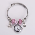 Detail of adjustable stainless steel charm bracelet watch with swan and heart pendants - Pink