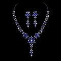 Close-up of elegant bridal jewelry set featuring blue crystals and silver-tone finish - Royal Blue Rhinestone Black Plated