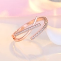 Macro shot of rose gold double layer cross ring with micro-set sparkling crystals - Rose Gold (J287)