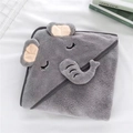 Soft grey elephant hooded baby towel in coral fleece laid on white bedsheet - Closed Eye Grey Elephant