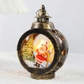 Vintage bronze Christmas lantern with Santa Claus scene and warm yellow LED lighting - Small Flat Round - Bronze Santa Claus