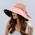 Women's pink wide-brim sun hat with straw top, decorative bow, and UV protection - Pink with Ribbon