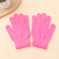 Close-up of rose pink knitted thermal gloves with ribbed cuffs on a neutral background - One Size / Deep Pink