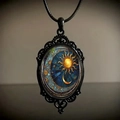 Close-up of gothic crow cross necklace with sun and moon mosaic pattern on black metal - 30*40 Sun Moon Star