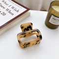 Minimalist square tortoiseshell acetate hair claw clip on white table with candle - Small Cream Tortoiseshell-5cm (No Logo)
