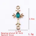 KC gold plated cross charm with an oval emerald green crystal for jewelry making - 11788 Gold Peacock Green