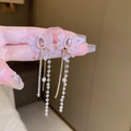 Detail view of pink butterfly earrings with diamond tassels and pearl accents - Pink Butterfly Tassel (22#)