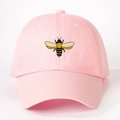 Pink cotton baseball cap featuring embroidered bee pattern and adjustable curved brim - Light Pink