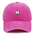 Detailed close-up of white tooth embroidery on a rose pink washed cotton baseball cap - Rose Red